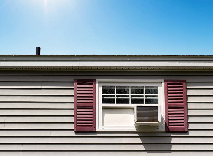 Window AC unit on a home